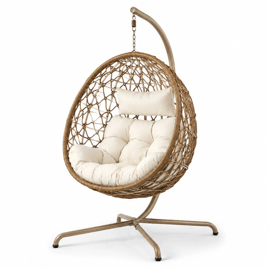 Poltrona sospesa in rattan e metallo con cuscino crema